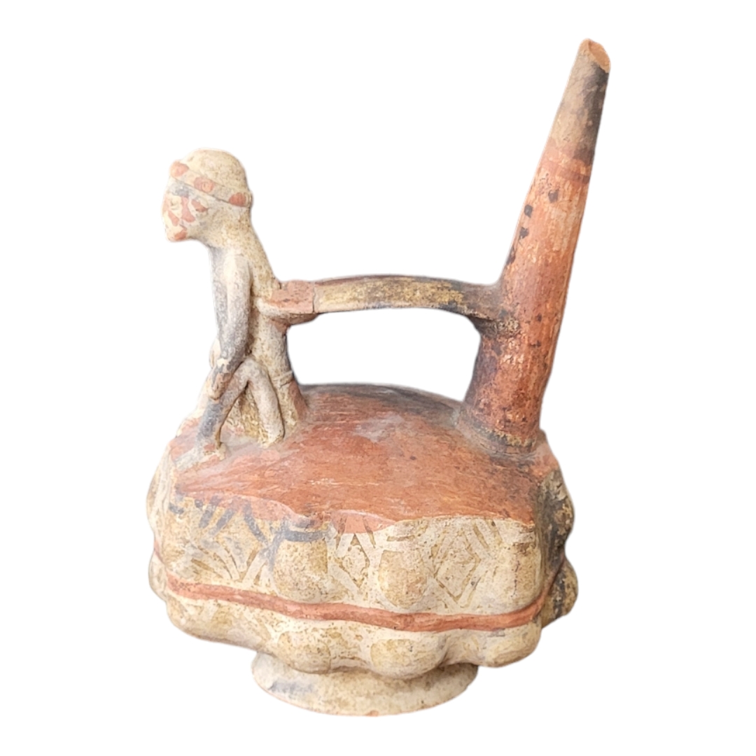 A SOUTH AMERICAN POTTERY FIGURAL WHISTLING JAR Trumpet form handle with seated figure on - Image 2 of 3