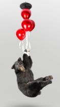 A FLOATING BEAR BY SIMON 'THE STUFFA' WILSON. A taxidermy American black bear (Ursus americanus)