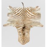 A LATE 20TH CENTURY TAXIDERMY BURCHELL'S ZEBRA SKIN RUG (EQUUS QUAGGA BURCHELLII). (250cm x 160cm)