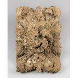 AN ANTIQUE CARVED ARCHITECTURAL FRAGMENT. (h 44cm x w 31cm x d 14cm)