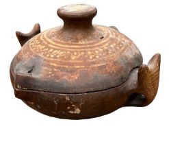 A SOUTH AMERICAN TERRACOTTA POTTERY COOKING POT AND COVER Twin animal mask handles and painted