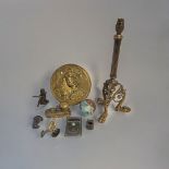 A 19TH CENTURY BRASS LION PAW LAMP BASE Having a reeded column and three scrolled legs with lion paw