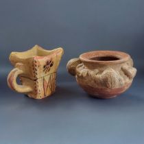 A SOUTH AMERICAN TERRACOTTA POTTERY FIGURAL BOWL Having applied masks/heads with exotic animals,