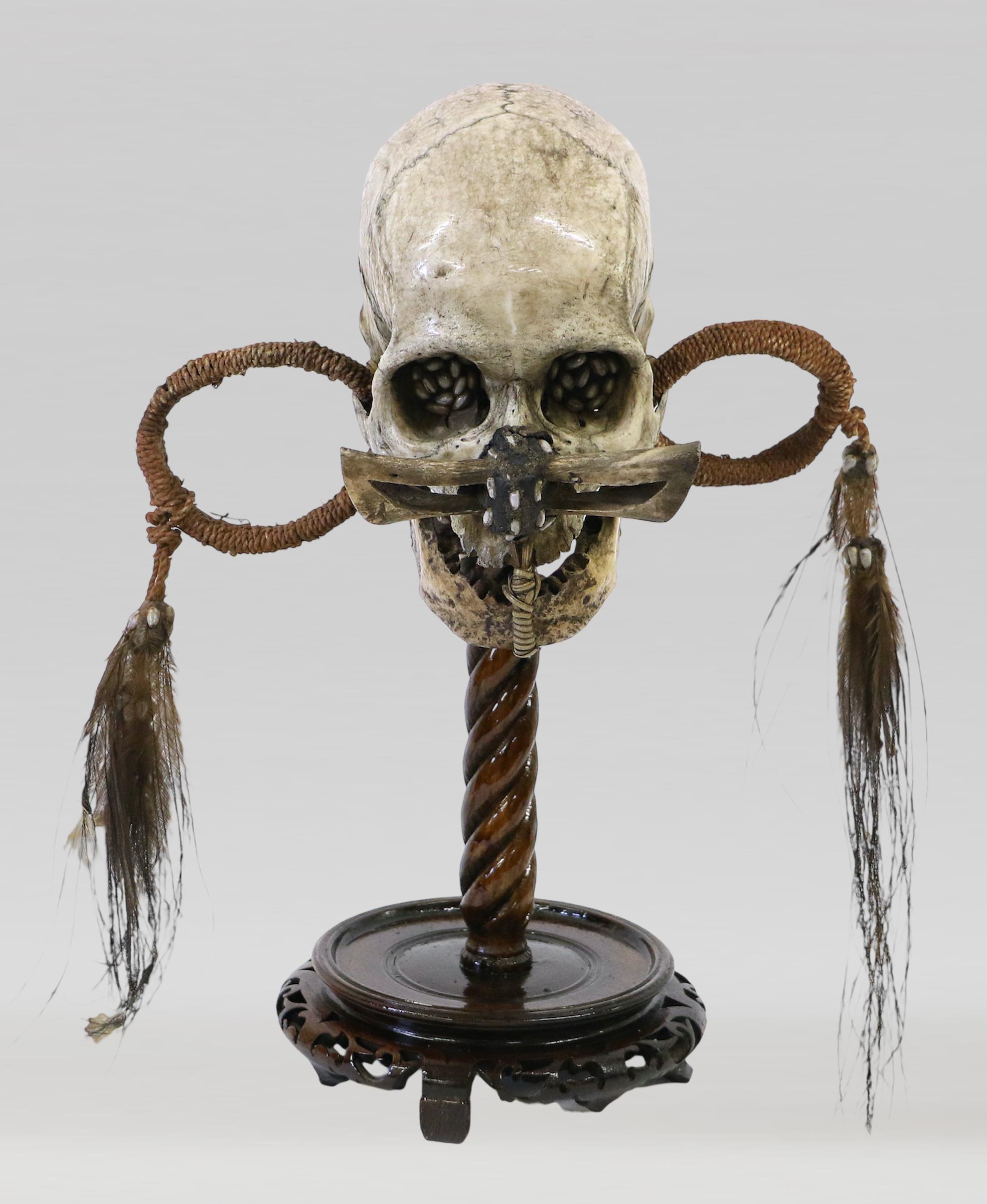 A 19TH CENTURY SCIENTIFIC MEDICAL STUDY TRIBAL SKULL, ASMAT "NDAMBIRKUS" ANCESTOR SKULL, NEW GUINEA. - Image 2 of 2