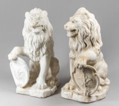 A LARGE 20TH CENTURY PAIR OF GLAZED LIONS, BEARING FLEUR-DE-LIS EMBLEM SHIELDS. (h 78cm x w 44cm x d