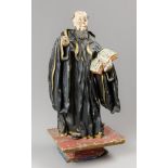 AN 18TH CENTURY ITALIAN WOODEN POLYCHROME SCULPTURE OF ST. BENEDICT OF NURSIA. Wood carved in full