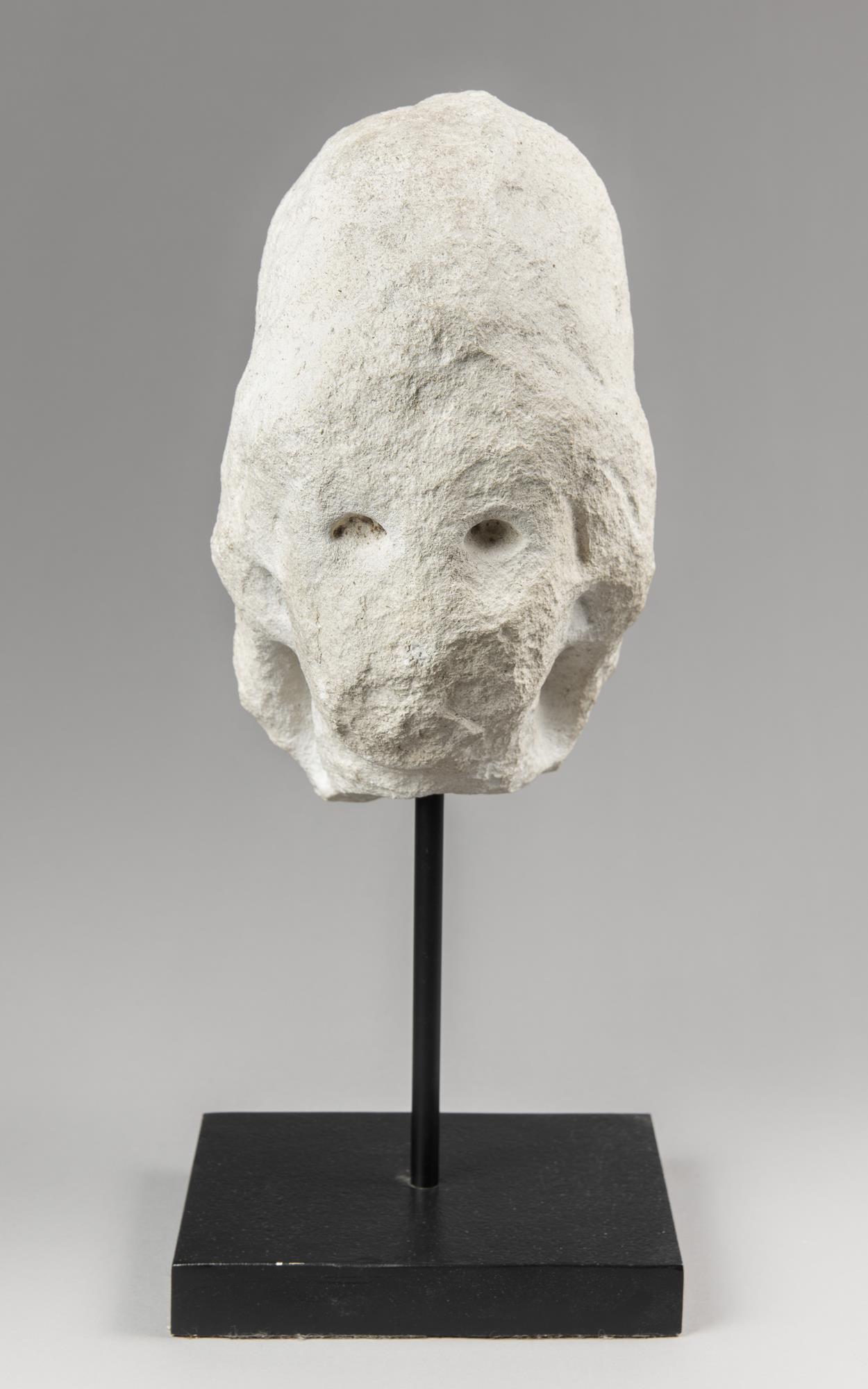 A LARGE ANCIENT STYLE FIGURE HEAD OF ROMAN GODDESS MINERVA. Mounted to a custom display stand.