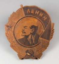 AN EARLY 20TH CENTURY RUSSIAN VLADIMIR LENIN CARVED & INLAID PORTRAIT PLAQUE. (h 35cm x w 31cm x d