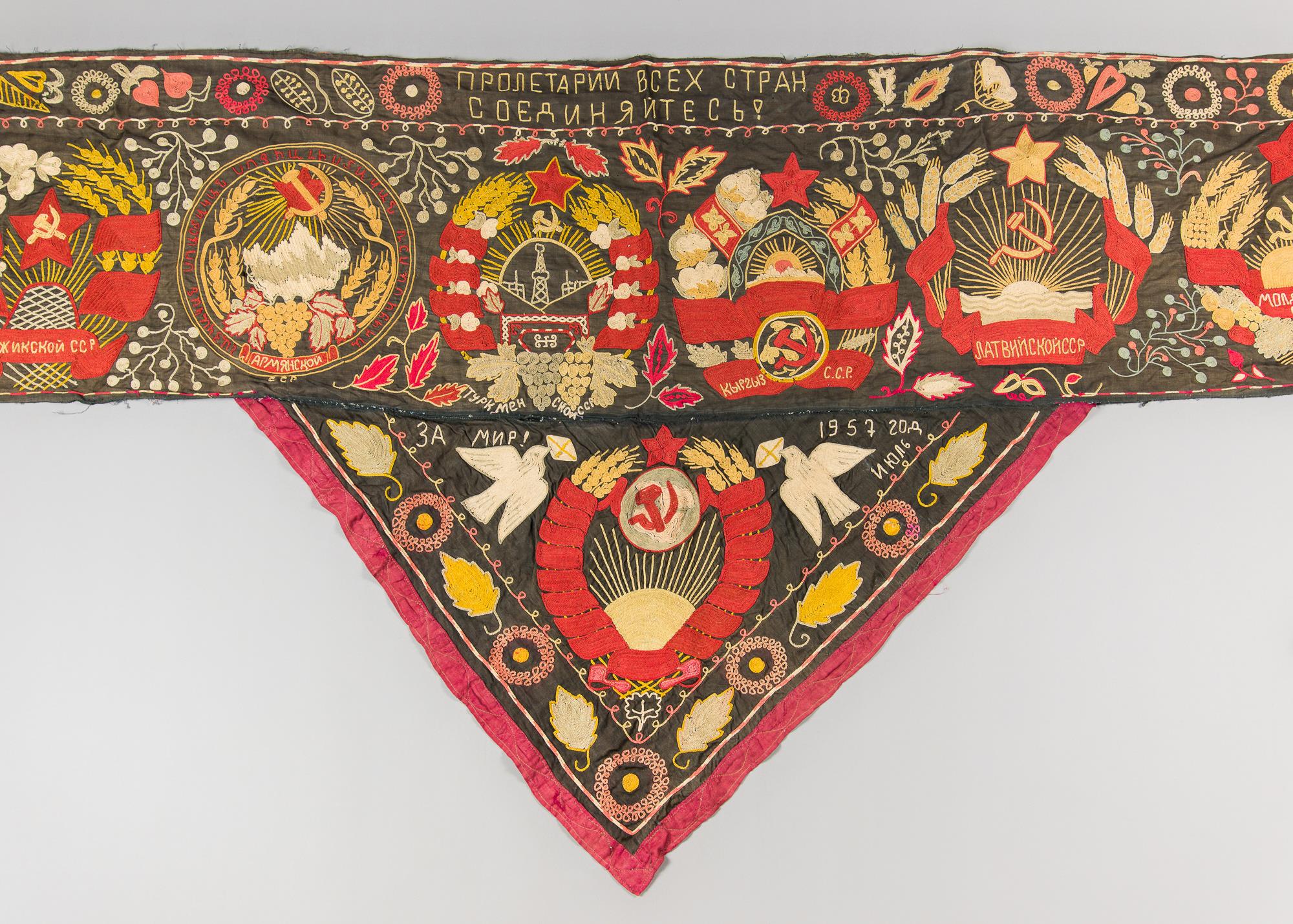 A RARE RUSSIAN SOVIET ERA TEXTILE PATCHWORK WALL HANGING. Dated 1957. (h 150cm x w 236cm)