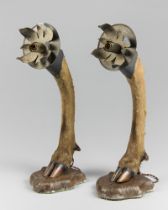 IN THE MANNER OF ROWLAND WARD, A PAIR OF EARLY 20TH CENTURY TAXIDERMY DEER HOOF LAMPS.