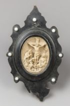 A 19TH CENTURY FRENCH PLASTER MEERSCHAUM PLAQUE DEPICTING THE CRUCIFIXION OF JESUS. (h 26cm)