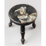 AN UNUSUAL SMALL 19TH CENTURY EBONISED STOOL WITH DOG PAINTING TO THE SEAT, ON THREE SPLAYED