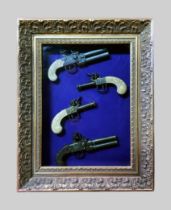 A COLLECTION OF IMITATION ANTIQUE PISTOLS IN A GLAZED FRAMED CASE