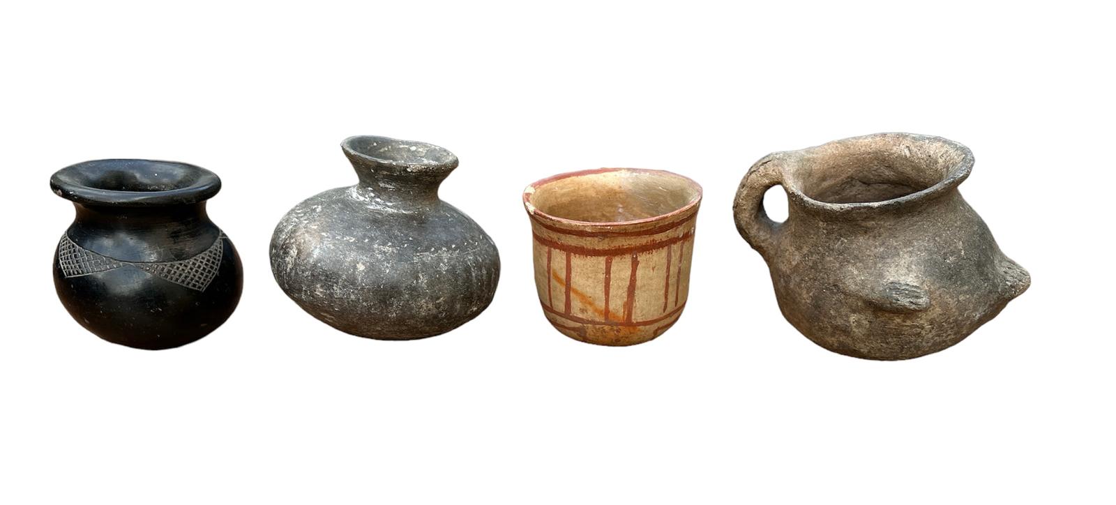 A COLLECTION OF FOUR SOUTH AMERICAN POTTERY VESSELS To include a terracotta pot with hand painted