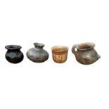 A COLLECTION OF FOUR SOUTH AMERICAN POTTERY VESSELS To include a terracotta pot with hand painted