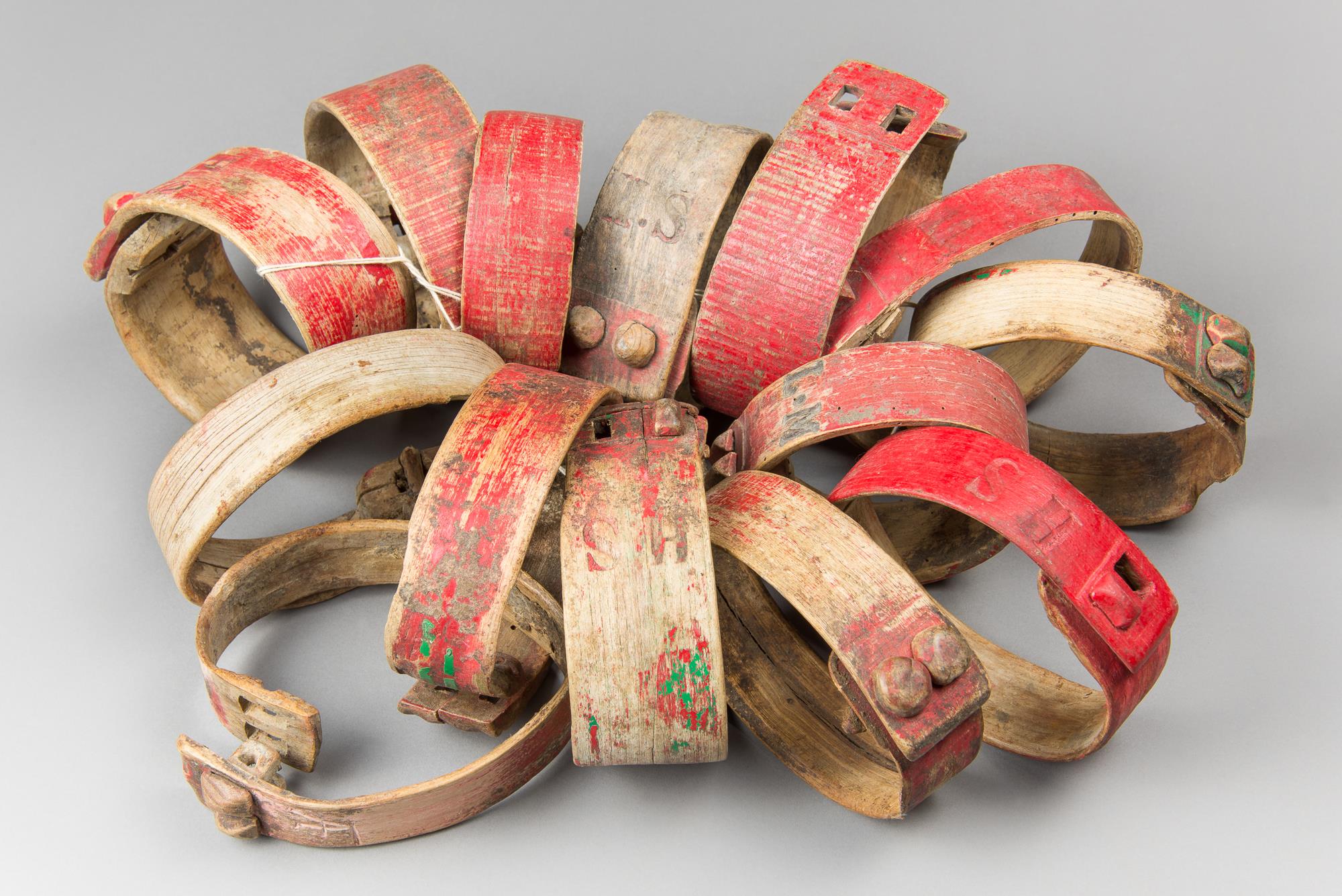 A COLLECTION OF EARLY 20TH CENTURY FRENCH GOAT COLLARS.