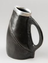 AN EARLY 20TH CENTURY DOULTON LAMBETH LEATHER JACKET TANKARD WITH STERLING SILVER RIM. Silver