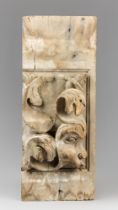 AN ANTIQUE CARVED ARCHITECTURAL FRAGMENT. (h 63cm x w 25cm x d 9cm)