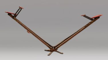 A RARE EARLY 20TH CENTURY 'FLEXY WHIRL' SEESAW, USA, C1930. Fold away garden seesaw on swivel stand.