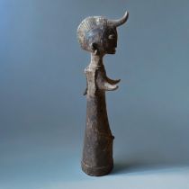 AN AFRICAN TRIBAL COPPER DOGON FIGURE Standing pose with protruding headdress and arms. (approx