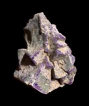 A GIGANTIC FLUORITE SPECIMEN (42KG). When illuminated with incandescent light fluorite is a purple