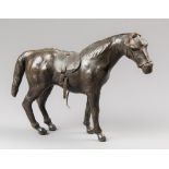 A 19TH CENTURY LEATHER CLAD MODEL OF A HORSE WITH GLASS EYES. (h 23cm x w 31cm x d 10cm)