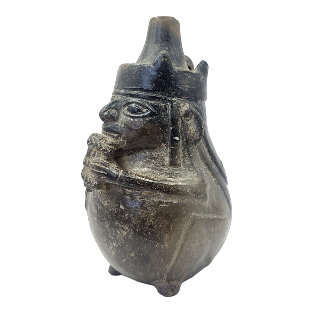 A SOUTH AMERICAN POTTERY FIGURAL JUG Cylindrical finial and playing pan pipes. (approx 18cm) - Image 2 of 5