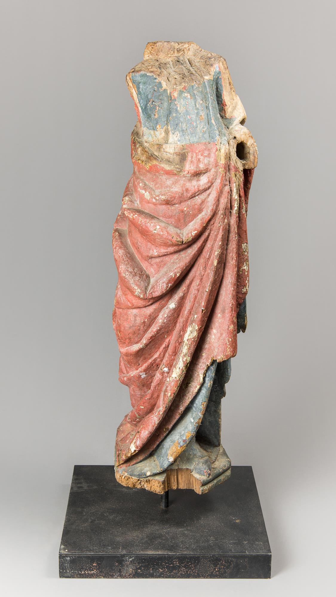 A LARGE CARVED WOOD POLYCHROME STATUE. Probably 15TH/16TH CENTURY, ITALY. On a custom stand. (h
