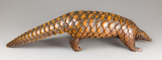 A LARGE AND IMPRESSIVE LATE 19TH CENTURY TAXIDERMY PANGOLIN (PHOLIDOTA). (h 22cm x w 89.5cm x d