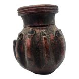 AN INDIAN 'HAND OF BUDDHA' POTTERY VASE Two handset base and with traces of painted decoration. (