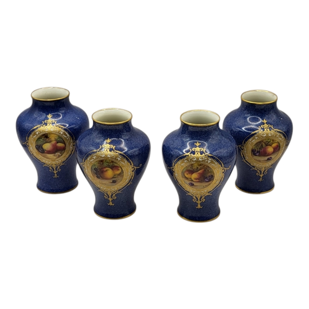 ROYAL WORCESTER, A SET OF FOUR PORCELAIN BALUSTER SHAPED VASES, CIRCA 1930 Painted with fallen
