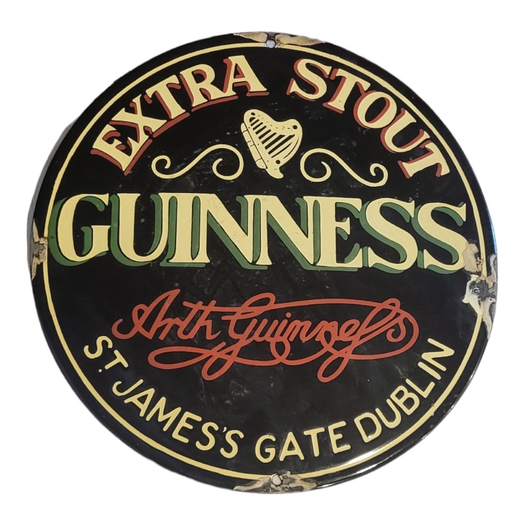 EXTRA STOUT GUINNESS, ST. JAMES GATE DUBLIN, A VINTAGE ENAMEL ADVERTISING SIGN. (31cm) Condition:
