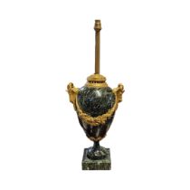 AN EARLY 20TH CENTURY CONTINENTAL NEOCLASSICAL SHAPED MARBLE MOUNTED AND GILT BRONZE PATINATED