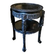 A LARGE 19TH CENTURY CHINESE CARVED HARDWOOD TWO TIER PLANT STAND With floral pierced apron,