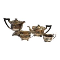 AN EARLY 20TH CENTURY SILVER FOUR PIECE TEA SET Including a teapot, hot water jug, sugar bowl and