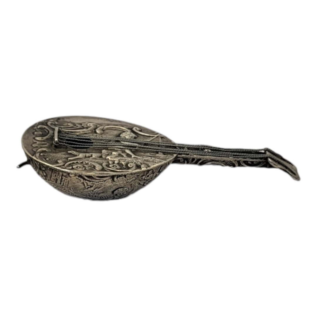 A 19TH CENTURY CONTINENTAL SILVER NOVELTY MANDOLIN Having an embossed design of a child fishing. ( - Image 2 of 3