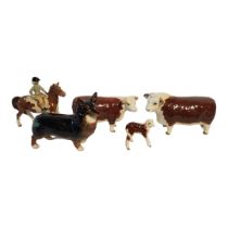 BESWICK, A COLLECTION OF VINTAGE PORCELAIN FIGURES Comprising a horse and rider, black prince dog,