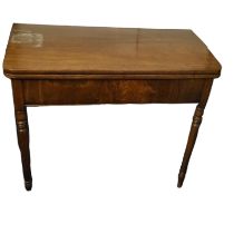 A GEORGE III MAHOGANY FOLDOVER TEA TABLE On ring turned tapering legs. (104cm x 48cm x 76cm)