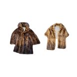 AN EARLY 20TH CENTURY MINK FUR COAT Brown fur with beige silk lining and embroidered initials,