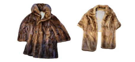 AN EARLY 20TH CENTURY MINK FUR COAT Brown fur with beige silk lining and embroidered initials,