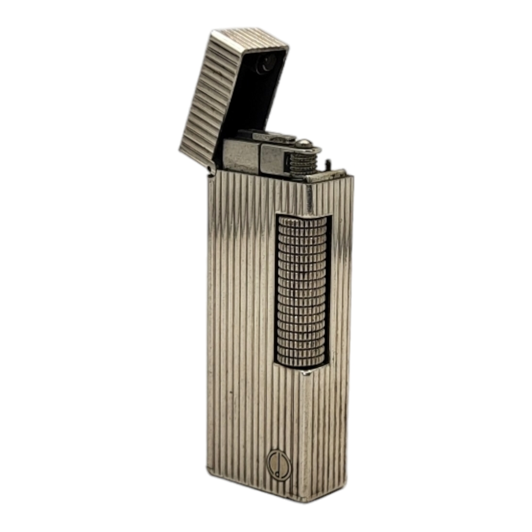 DUNHILL, A VINTAGE WHITE METAL CIGARETTE LIGHTER Reeded case marked number 22385, in Dunhill box. ( - Image 2 of 5