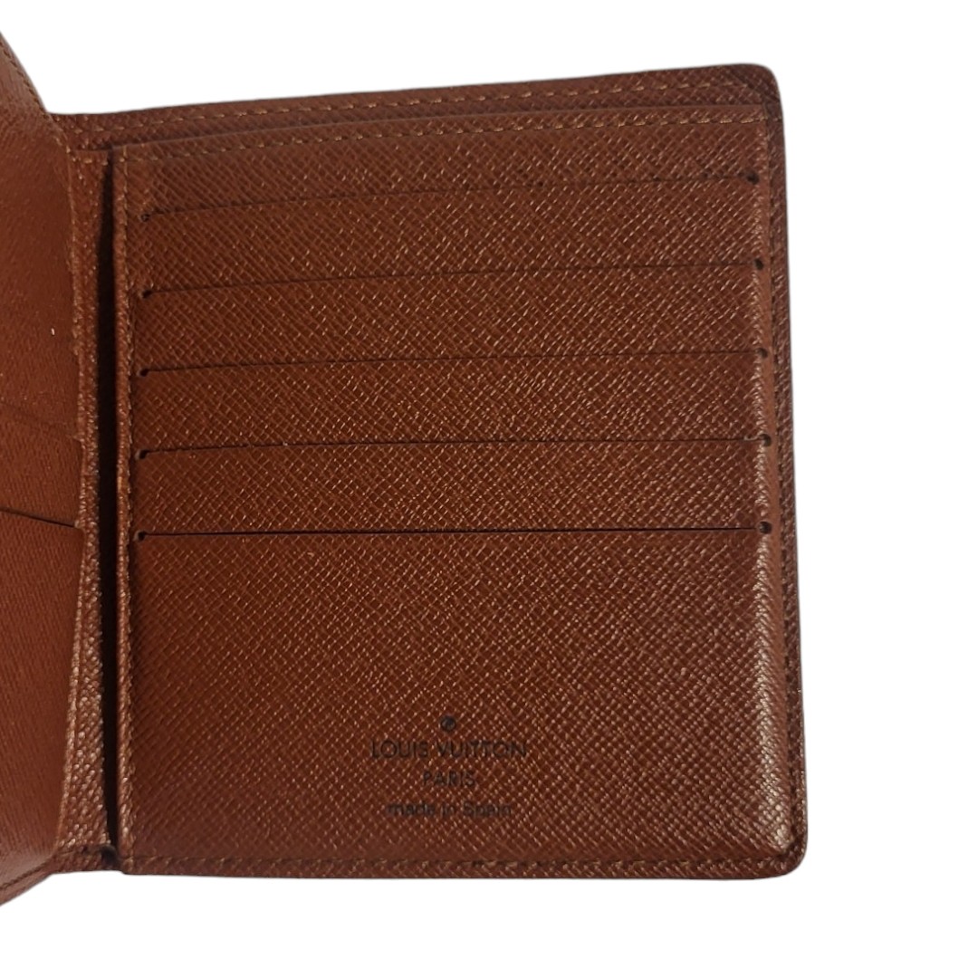 LOUIS VUITTON, A BROWN LEATHER MONOGRAM WALLET Card spaces and large note compartment, marked to - Image 3 of 3