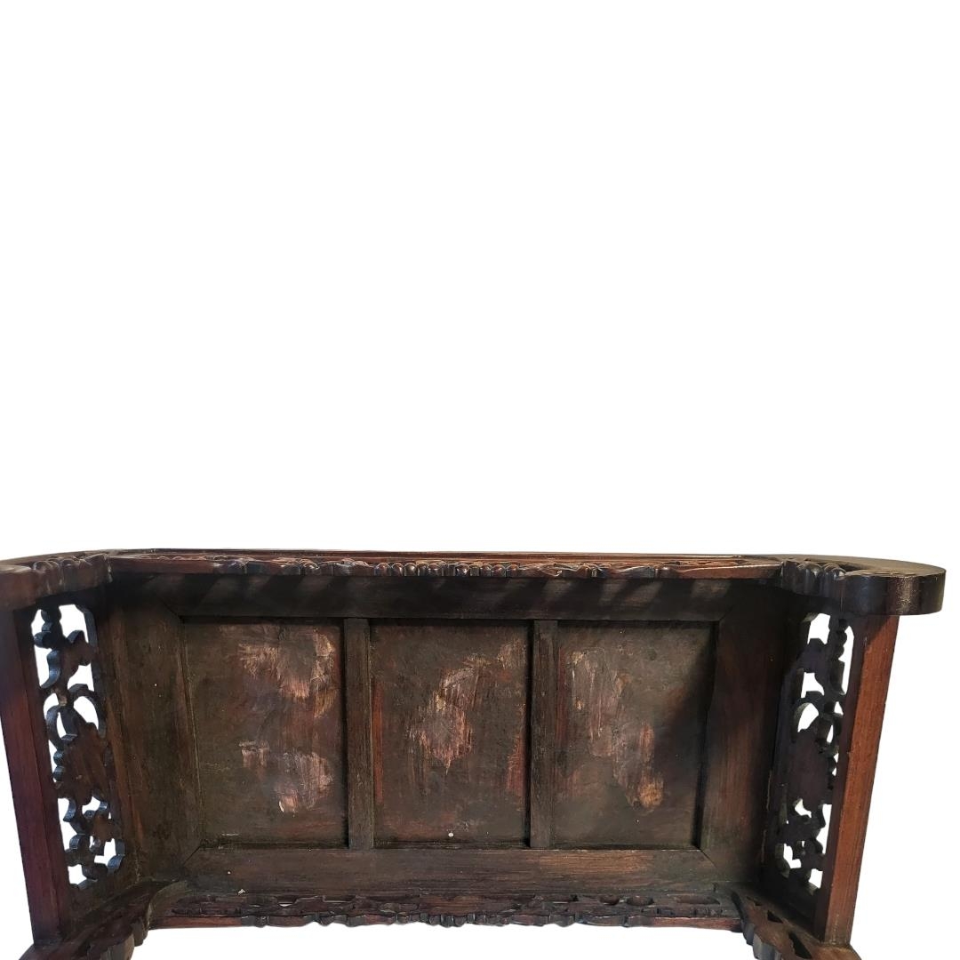 A CHINESE LATE QING DYNASTY SCHOLARS HARDWOOD ALTAR TABLE, CIRCA 1900 The border carved with - Image 5 of 5