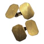A PAIR OF EARLY 20TH CENTURY 9CT GOLD GENT’S CUFFLINKS Octagonal with engraved decoration. (approx