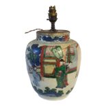 AN 18TH CENTURY CHINESE FAMILLE ROSE/VERTE BALUSTER SHAPED LAMP BASE Polychrome painted with a