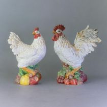 A PAIR OF LATE 20TH CENTURY DECORATIVE EARTHENWARE MODEL OF A FARMHOUSE COCKEREL AND CHICKEN Both