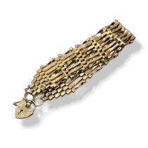 AN EARLY 20TH CENTURY 9CT GOLD GATE BRACELET Pierced links with heart form clasp. (approx 9cm)