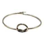 GEORG JENSEN, A VINTAGE DANISH SILVER BANGLES Single wire with knot, oval mark number A44C 925 (