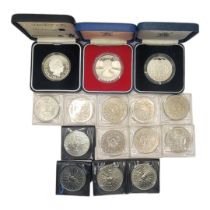 A COLLECTION OF THREE QUEEN ELIZABETH II SILVER COINS To include a five pound coin, dated 1990, a