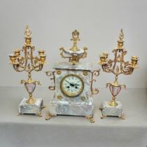 A LARGE AESTHETIC INSPIRED BRONZE CASED MANTLE CLOCK With urn and acorn finials above white